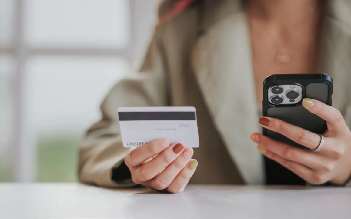 A woman successfully paying with her preferred payment method